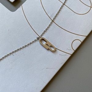 URBAN OUTFITTERS PAPER CLIP CHARM NECKLACE in silver brand new